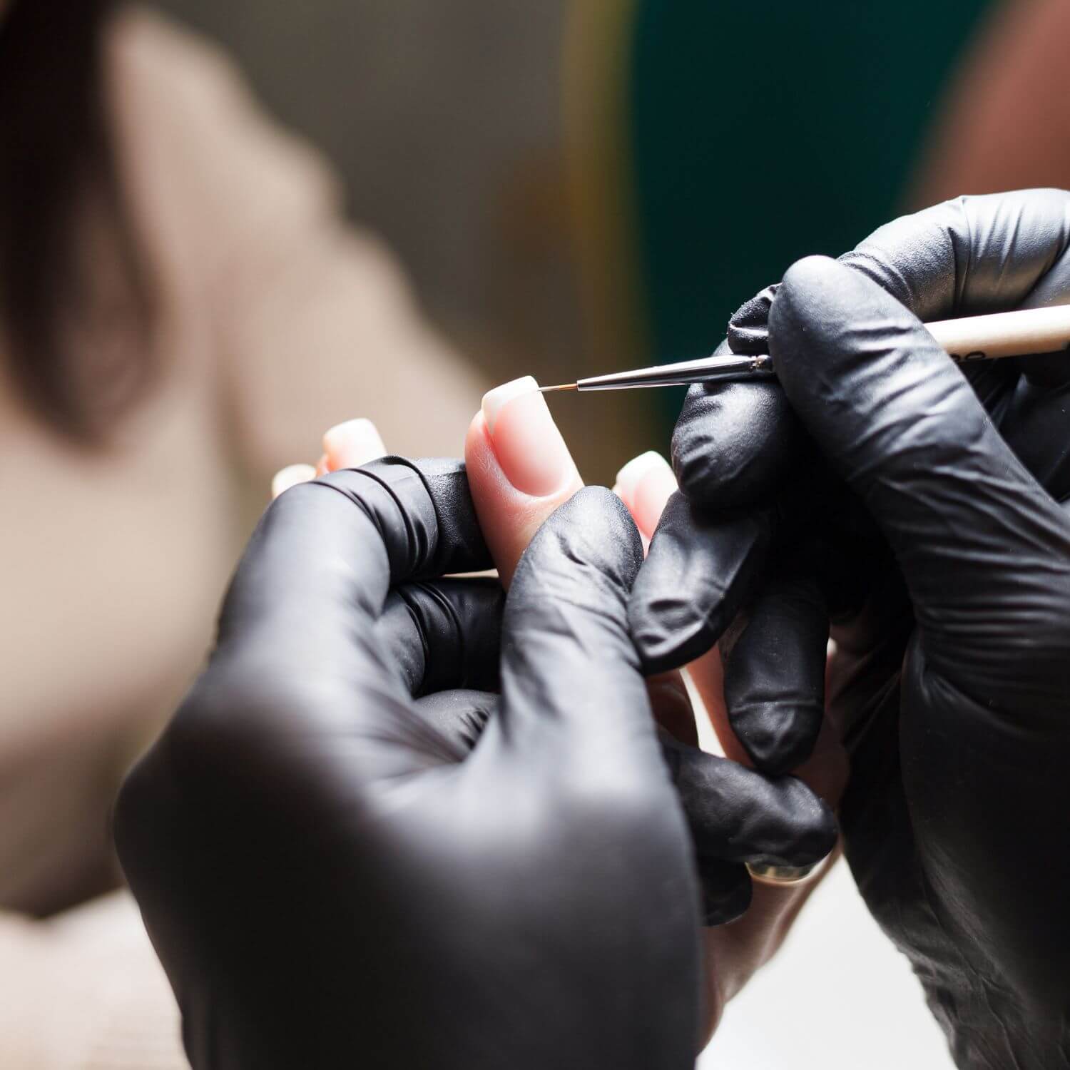 Nail technician at work in a salon